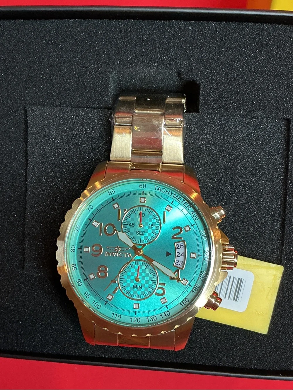Invicta Gold Tone Watch with Teal Blue Dial